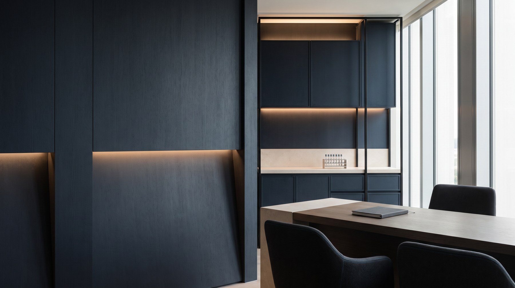 Conceptual rendering of an empty premium clinical consultation suite with charcoal cabinetry, pale stone and warm lighting, not an actual room at Aeon Wellness Club