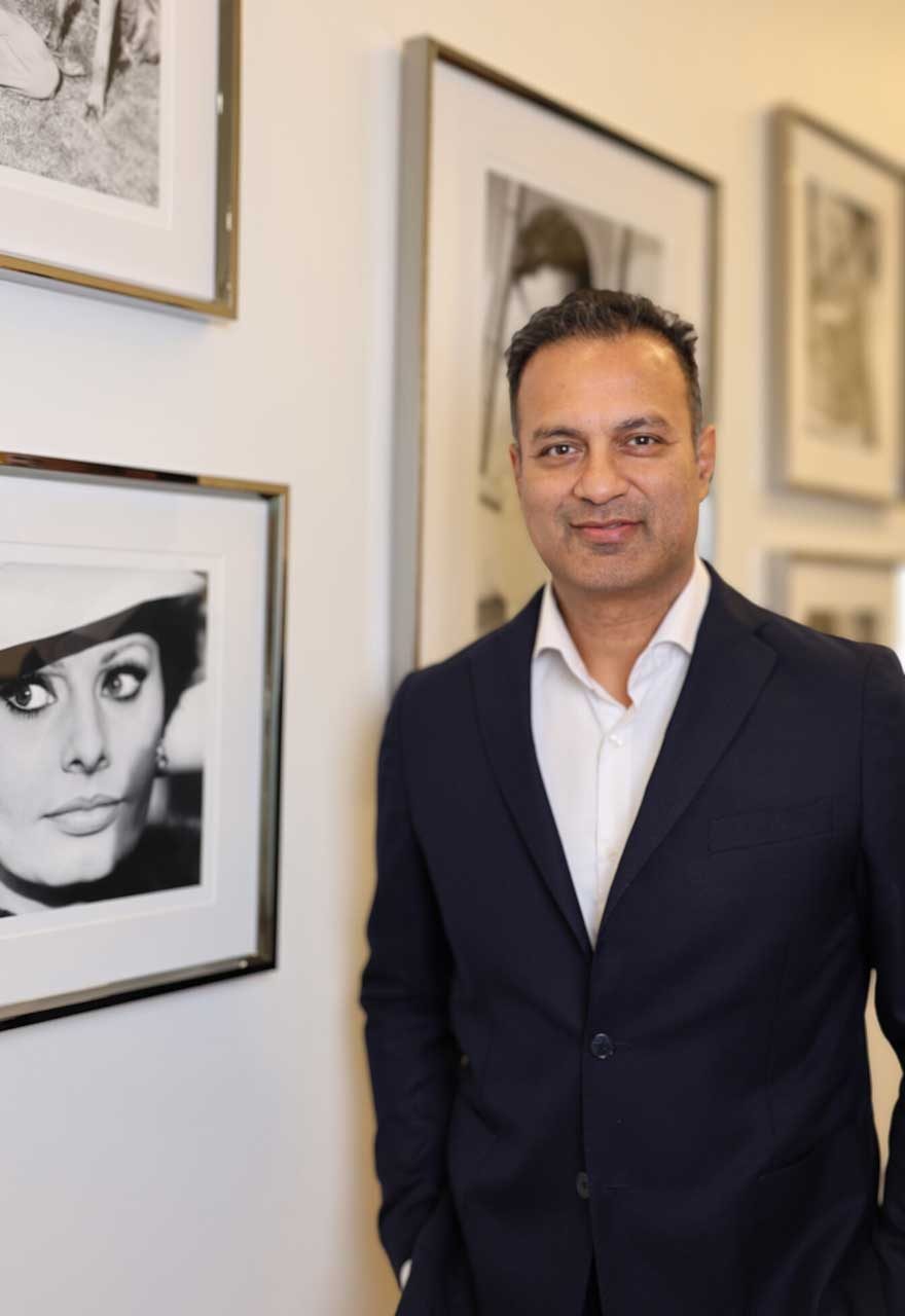 Dr. Sid Sharma, Medical Director of Aeon Wellness Club, in his original portrait from the club's website