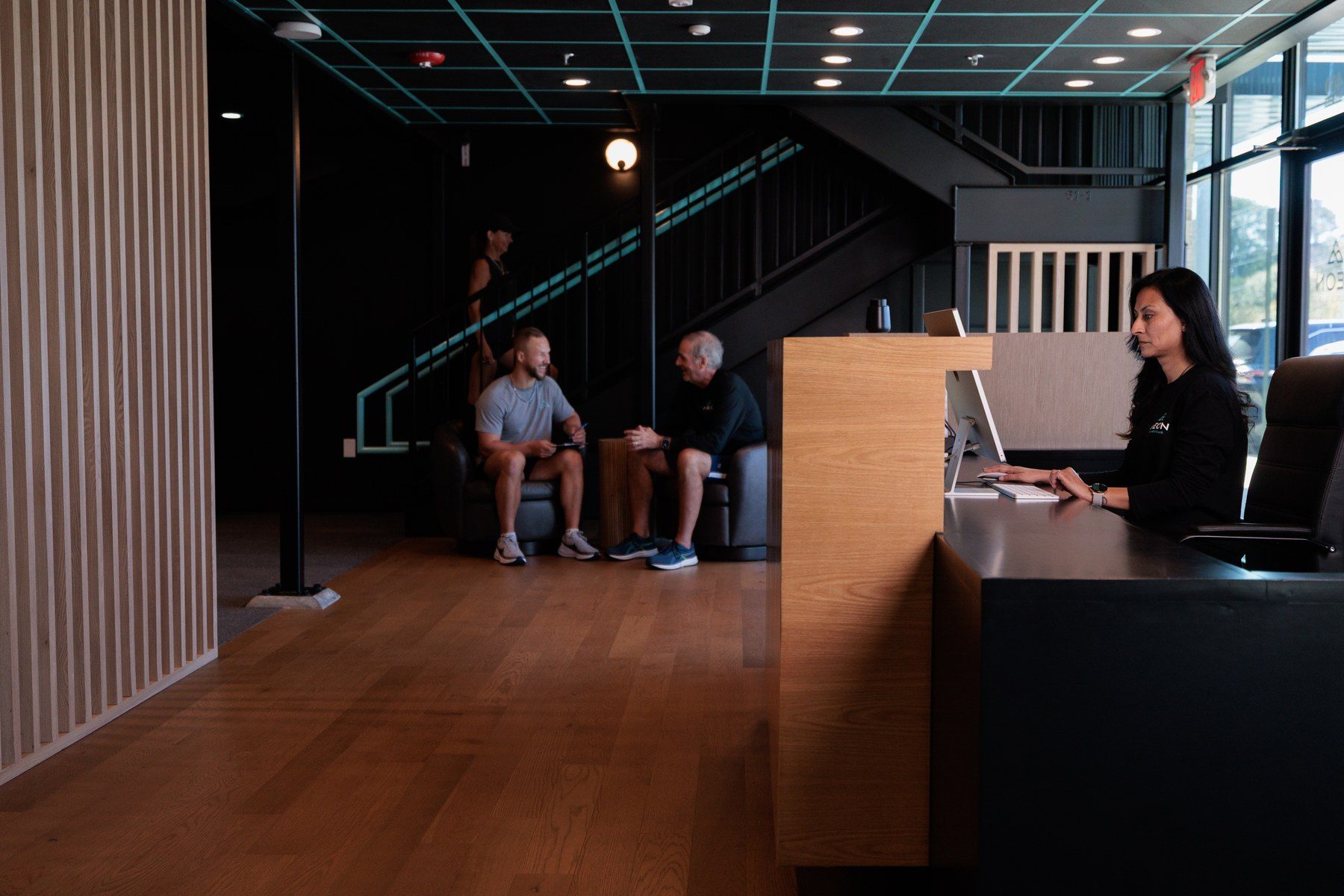 The reception and member lounge at Aeon Wellness Club on McFarland Parkway in Alpharetta